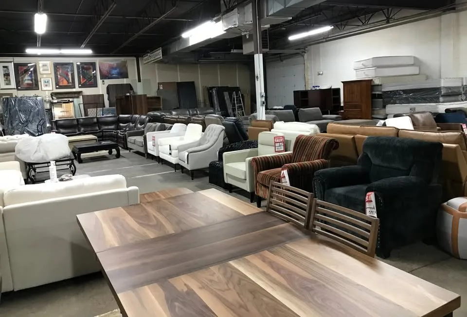 Accent chairs, recliners, and a walnut extension dining table at Unique Furniture Warehouse, Twin Cities furniture outlet
